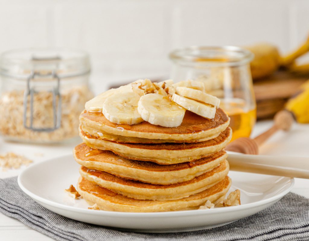 A,Stack,Of,Oatmeal,Banana,Pancakes,With,Slices,Of,Fresh