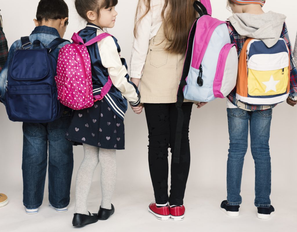 Group,Of,Schoolers,Kids,With,Backpack,Behind,Rear,View,On